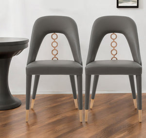 Homeroots Set Of Two Gray Faux Leather Dining Side Chairs With Rose Gold Accents  Metal 488511