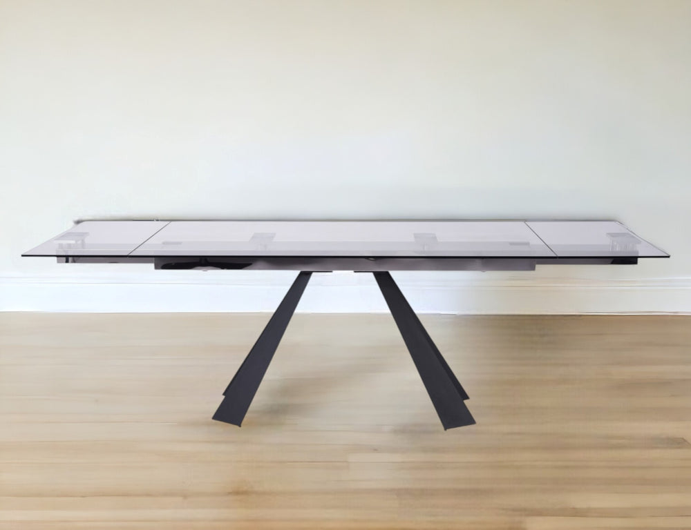 Homeroots 63" Clear And Black Glass And Metal Drop Leaf Pedestal Base Dining Table   488514