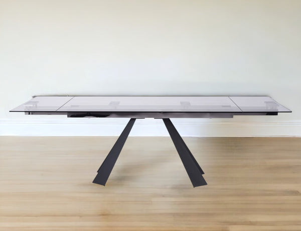 Homeroots 63" Clear And Black Glass And Metal Drop Leaf Pedestal Base Dining Table   488514