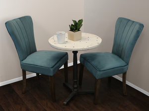 Homeroots 24" Ivory And Black Stone And Iron Round Bistro Dining Table   488591