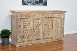 HomeRoots 76" Antiqued White Distressed Solid Wood Sideboard with Floral Carvings & Ample Storage Solutions 488629