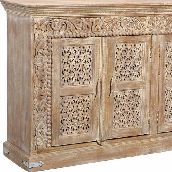 HomeRoots 76" Antiqued White Distressed Solid Wood Sideboard with Floral Carvings & Ample Storage Solutions 488629