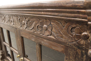 HomeRoots 60" Brown Distressed Solid Wood Buffet Table with Glass Doors, Floral Carvings & Brass Hardware 488634