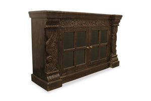HomeRoots 60" Brown Distressed Solid Wood Buffet Table with Glass Doors, Floral Carvings & Brass Hardware 488634