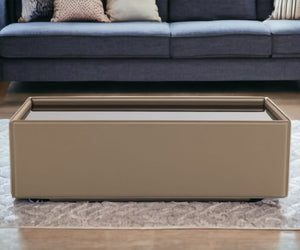 Homeroots 44" Beige And Black Faux Leather And Glass Rectangular Coffee Table   488709