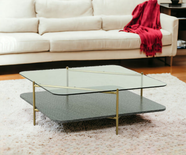 Homeroots 43" Gold And Clear Glass Square Coffee Table With Shelf   488720