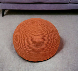 Homeroots 20" Orange Wool Round Ribbed Pouf Ottoman   488743