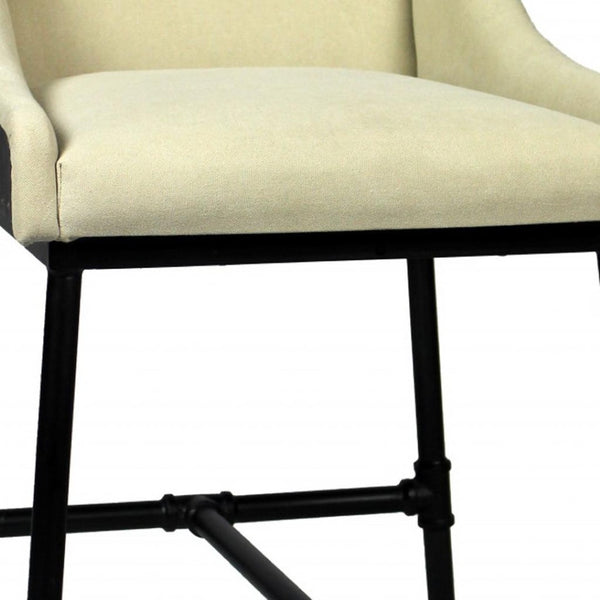 HomeRoots Beige Upholstered Arm Chair - Mid-Century Modern Design with Black Legs for Dining & Accent Use 488777