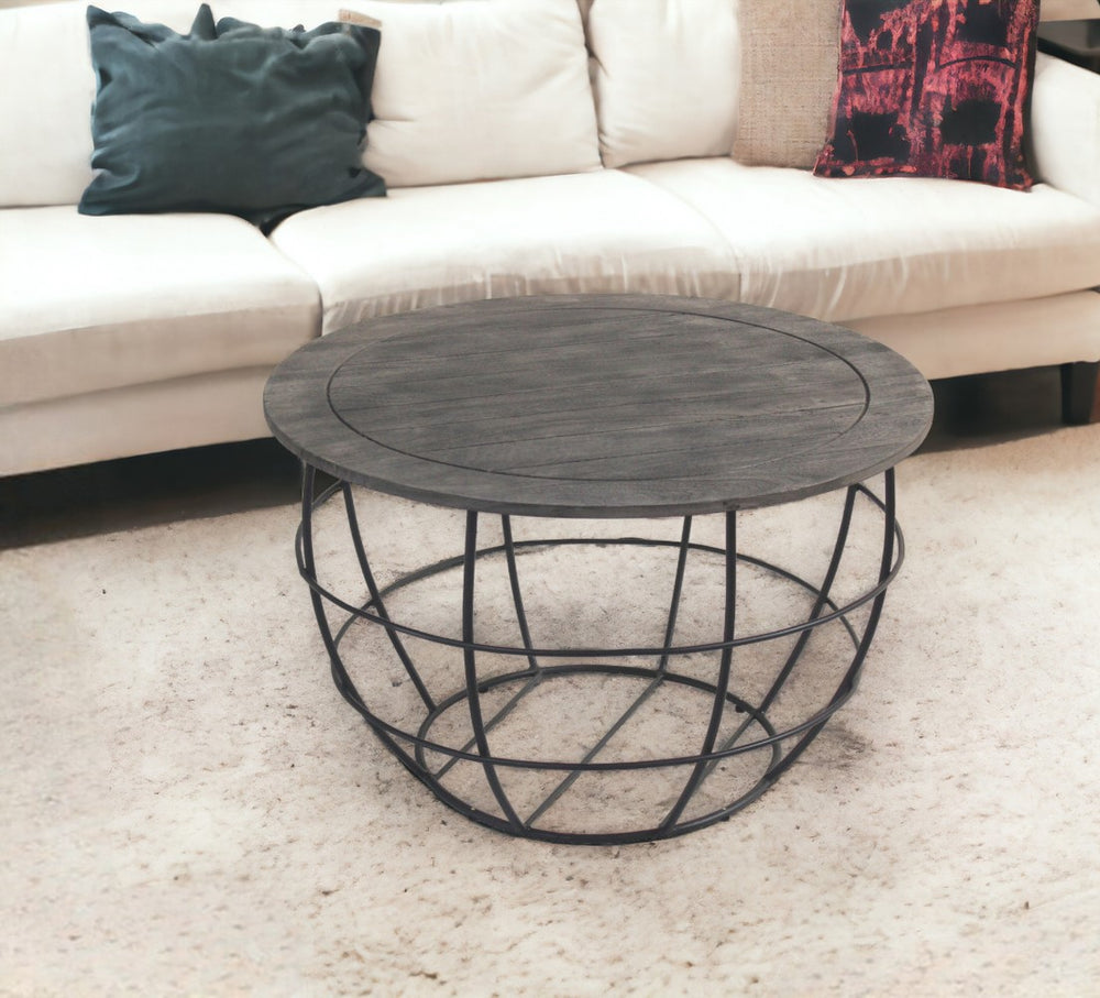 Homeroots 32" Gray Wash Solid Wood And Cast Iron Round Distressed Coffee Table   488788