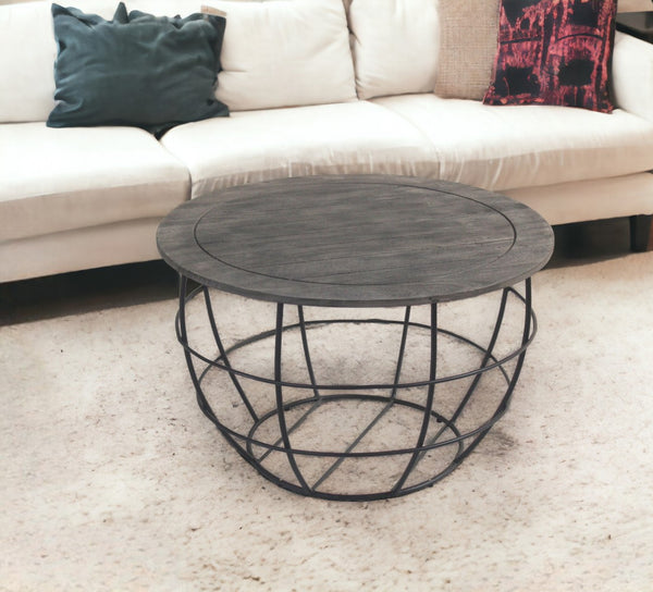 Homeroots 32" Gray Wash Solid Wood And Cast Iron Round Distressed Coffee Table   488788