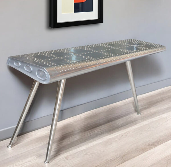 Homeroots 56" Silver Aluminum Three Leg Console Table   488799