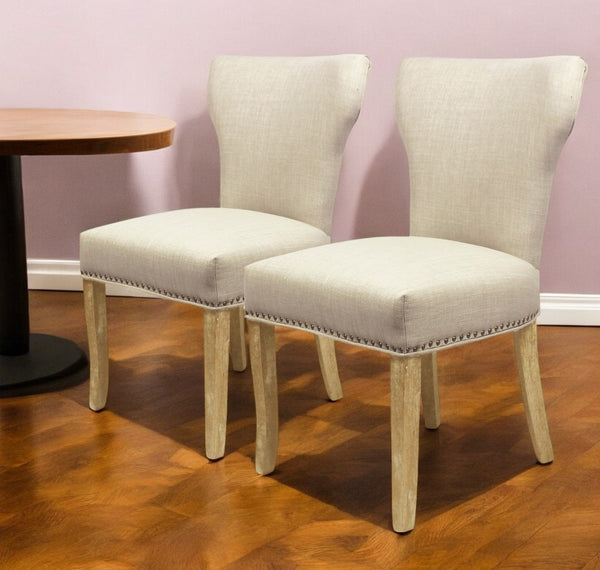 HomeRoots Set of Two Elegant Ivory Upholstered Parsons Chairs with Natural Wood Legs for Stylish Dining Decor 488823