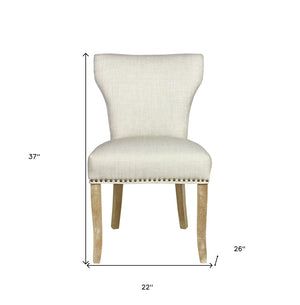 HomeRoots Set of Two Elegant Ivory Upholstered Parsons Chairs with Natural Wood Legs for Stylish Dining Decor 488823