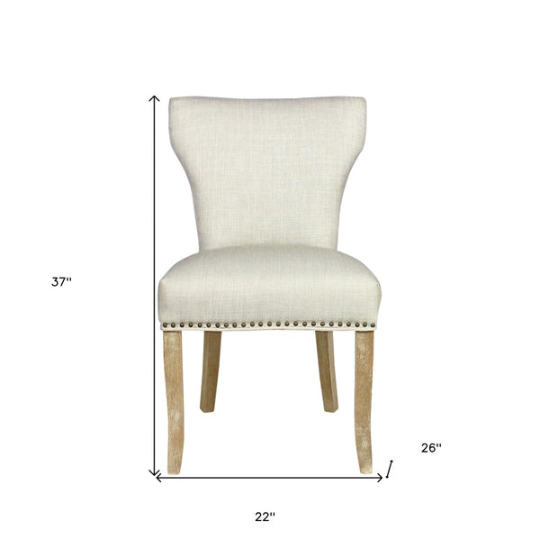 HomeRoots Set of Two Elegant Ivory Upholstered Parsons Chairs with Natural Wood Legs for Stylish Dining Decor 488823