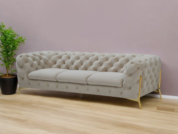 Homeroots 97" Beige Velvet Chesterfield Sofa With Gold Legs   488829