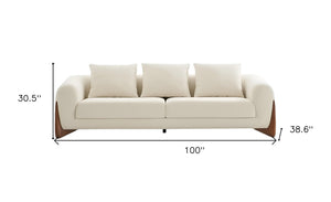 Homeroots 100" Cream Fabric Sofa With Wood Brown Legs   488842