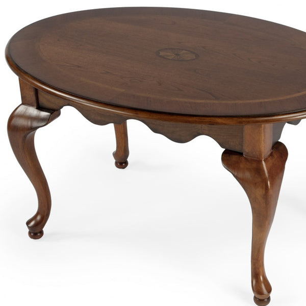 Homeroots 38" Olive Ash Oval Distressed Coffee Table   488880