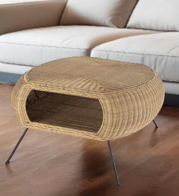 HomeRoots 38" Elegant Natural Rattan and Black Iron Oval Coffee Table with Lower Shelf for Stylish Storage 488883