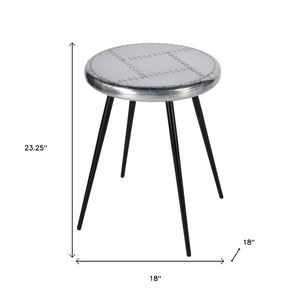 HomeRoots 23" Silver Round End Table - Chic Industrial Design with Aviator Patchwork for Modern Spaces 488936