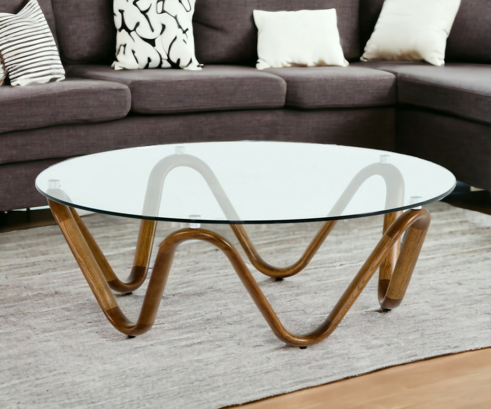 Homeroots 45" Clear And Brown Glass And Solid Wood Round Coffee Table   489059