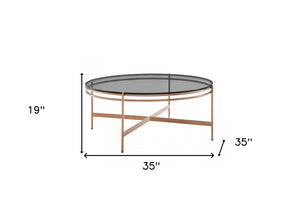 Homeroots 35" Gold And Smoked Glass Round Coffee Table   489061