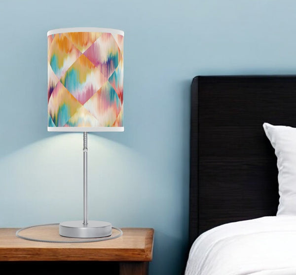 Homeroots 20" Silver Table Lamp With White And Colorful Abstract Ikat Cylinder Shade   489260