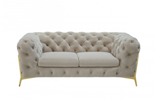 HomeRoots 74" Beige Velvet Chesterfield Loveseat with Gold Legs - Luxurious Tufted Design for Stylish Comfort 489282