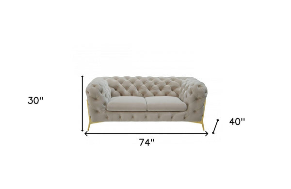 HomeRoots 74" Beige Velvet Chesterfield Loveseat with Gold Legs - Luxurious Tufted Design for Stylish Comfort 489282