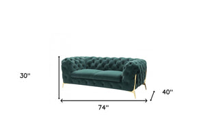 HomeRoots 74" Elegant Emerald Green Velvet Chesterfield Loveseat with Gold Legs for Modern Glam Spaces 489283