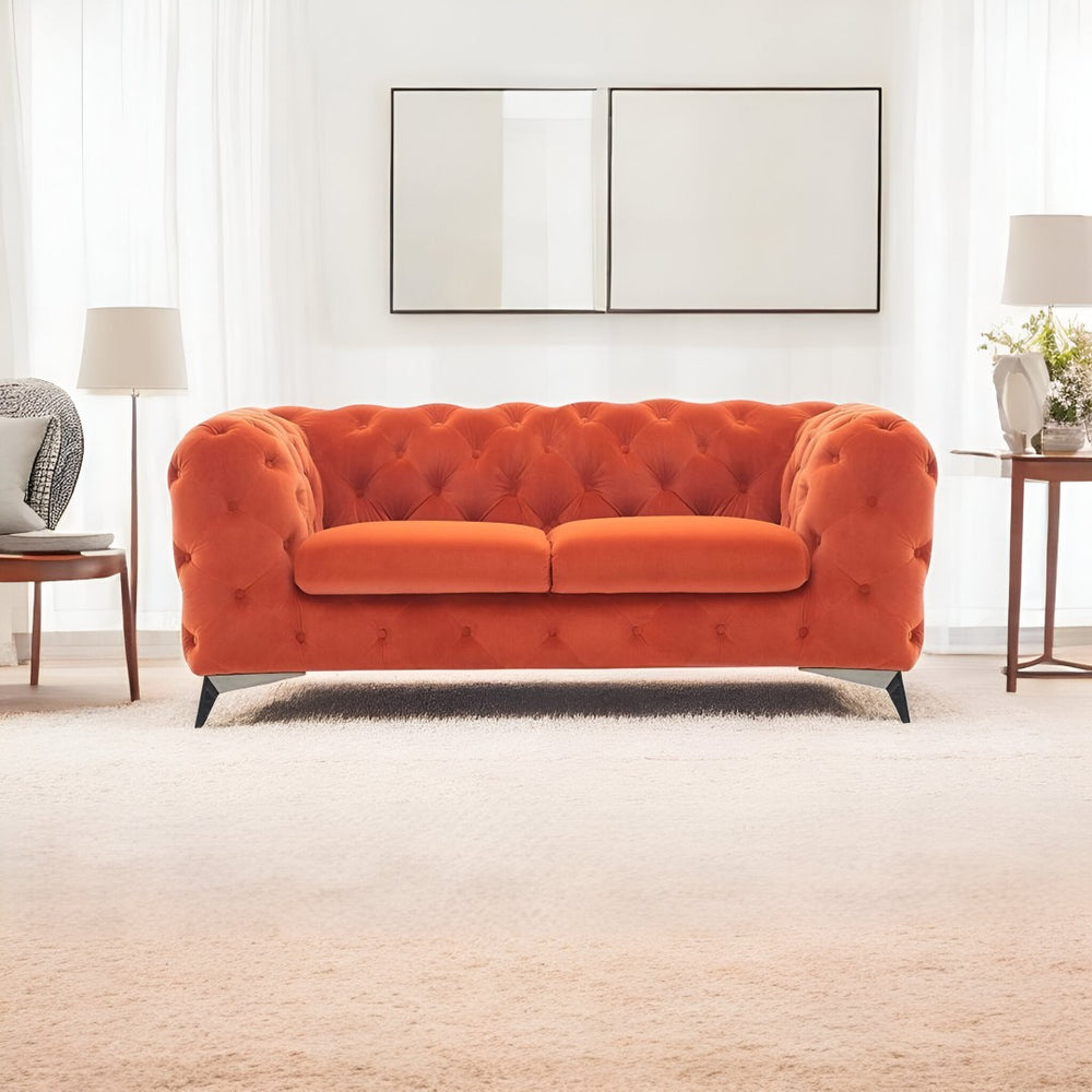 HomeRoots 74" Orange Velvet Chesterfield Loveseat with Silver Legs - Elegant, Modern Design for Luxurious Spaces 489288