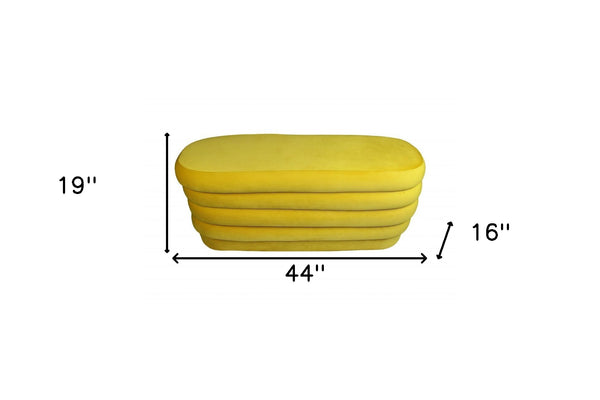 Homeroots 44" Yellow Velvet Tufted Oval Ottoman   489309