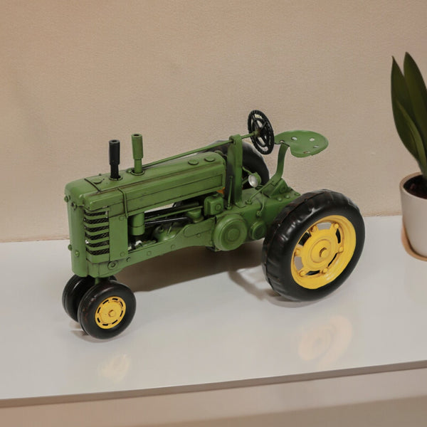 Homeroots 7" Green And Black Metal Hand Painted Model Tractor Tabletop Sculpture  Metal 489418