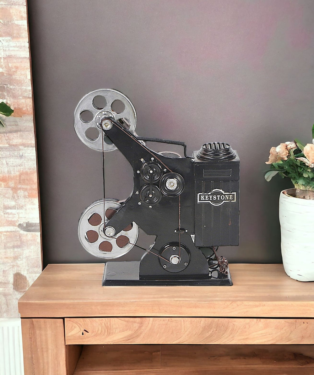 Homeroots 14" Black And Gray Metal Movie Hand Painted Figurine  Metal 489426