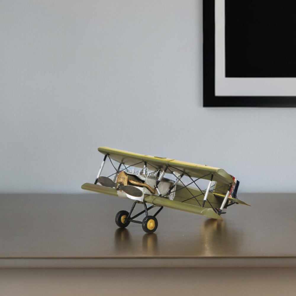 Homeroots 6" Yellow And Green Metal Hand Painted Model Airplane Tabletop Sculpture  Metal 489430