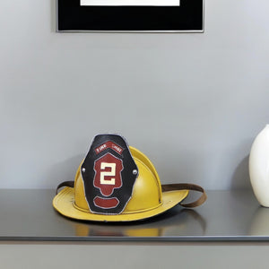 Homeroots 8" Yellow And Black Metal Fireman Hand Painted Figurine Tabletop Sculpture  Metal 489463