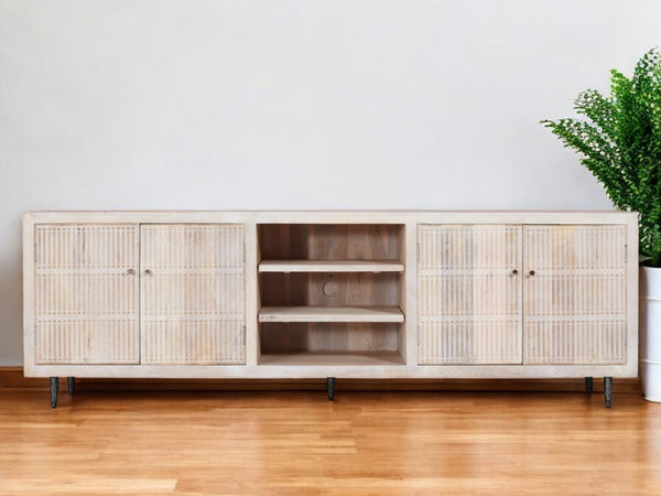 HomeRoots 92" Artisan Carved Ivory Distressed Wood TV Stand with Open Storage & Enclosed Cabinets for Style 489508