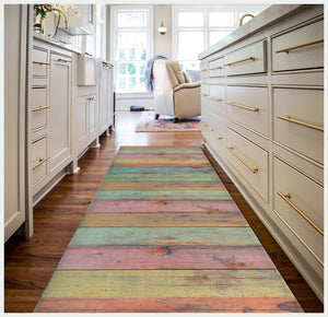 Homeroots 2' X 5' Distressed Aqua Green And Pink Printed Vinyl Area Rug With Uv Protection  Linoleum 489510