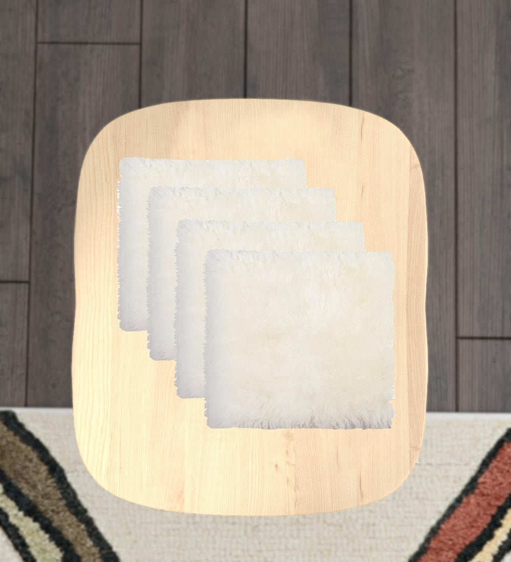 HomeRoots Set of Four 17" X 17" Plush Natural Wool Chair Pads for Ultimate Comfort & Stylish Dining Experience 489527