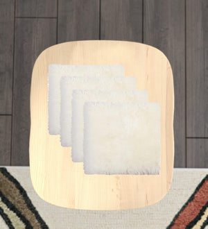 Homeroots Set Of Four 17" X 17" Natural Wool Solid Color Chair Pads  Sheepskin 489527
