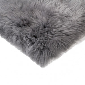 HomeRoots Set of Four Luxurious 17" Grey Wool Chair Pads - Premium Sheepskin Comfort for Dining & Living Spaces 489528