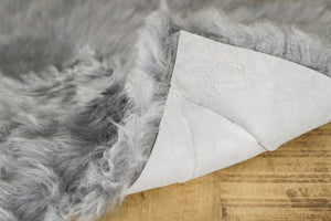 HomeRoots Set of Four Luxurious 17" Grey Wool Chair Pads - Premium Sheepskin Comfort for Dining & Living Spaces 489528