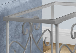 HomeRoots 22" Elegant Silver and Clear Glass End Table with Scrollwork Design - Versatile Two-Tier Storage 489714