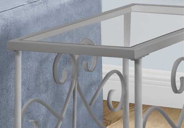 HomeRoots 22" Elegant Silver and Clear Glass End Table with Scrollwork Design - Versatile Two-Tier Storage 489714