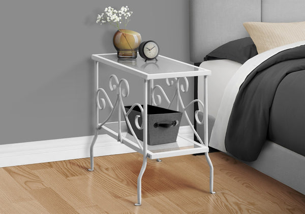 HomeRoots 22" Elegant White Metal and Clear Glass End Table with Stylish Scrollwork and Two-Tier Storage 489715
