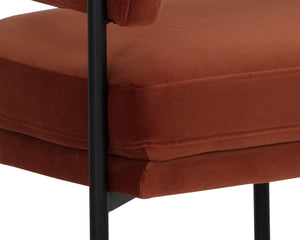 Sunpan Lola Lounge Chair - Contemporary Comfort with Elegant Curves and Matte Black Iron Frame Design Meg Rust