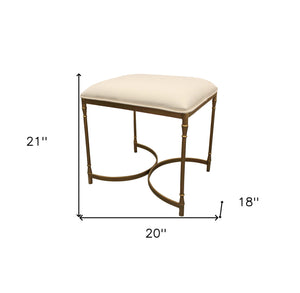 Homeroots 20" Ivory Canvas And Brass Ottoman   490158
