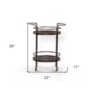 Homeroots Dark Gray Iron And Solid Wood Round Rolling Bar Cart   490202