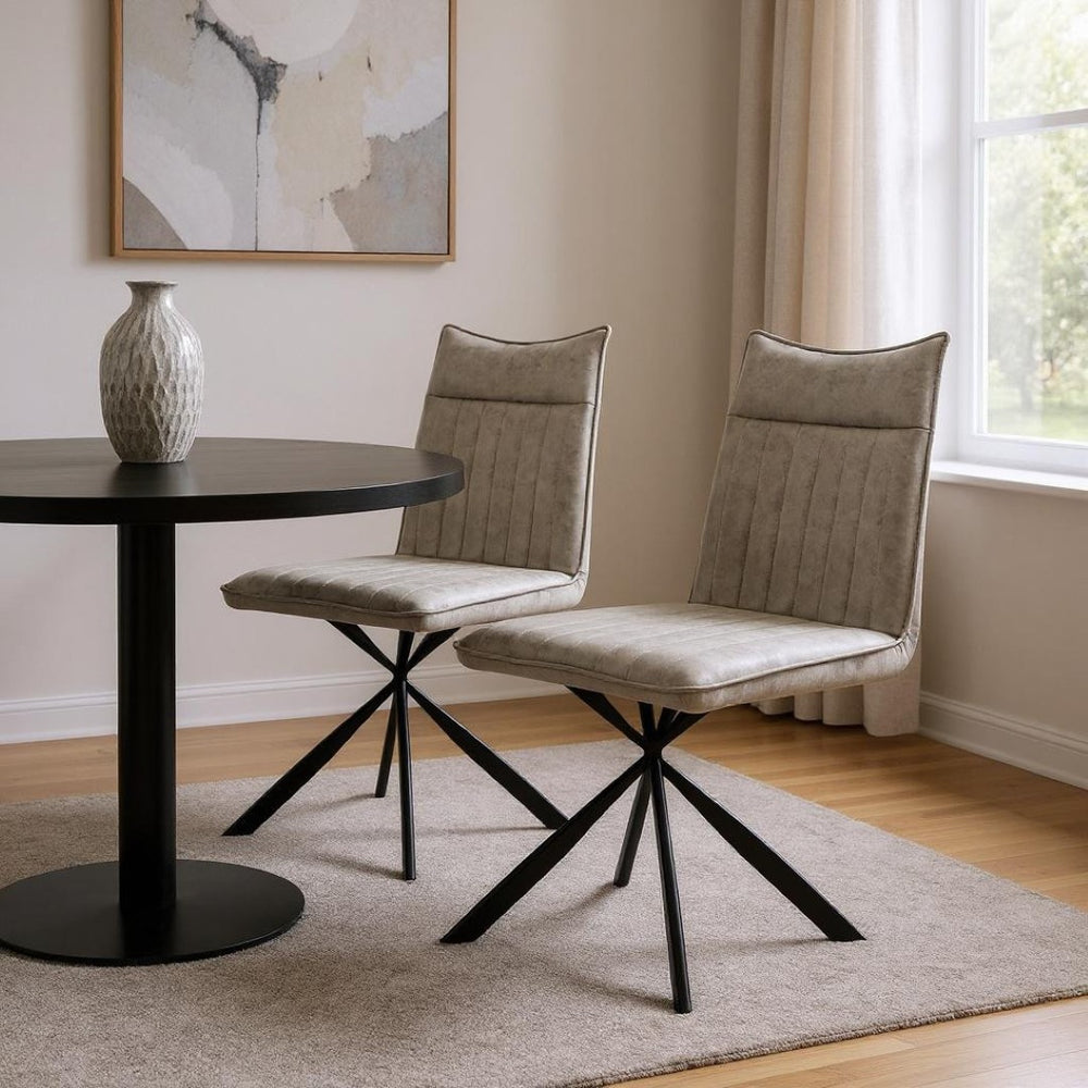 HomeRoots Set of Two Stylish Tufted Taupe Faux Leather Dining Chairs with Sleek Black Metal Legs for Comfort 490310
