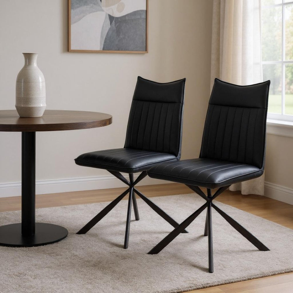 HomeRoots Set of Two Modern Tufted Black Faux Leather Dining Chairs with Metal Legs for Stylish Comfort 490315