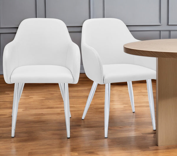 Homeroots Set Of Two Stylish White & Silver Faux Leather Dining Arm Chairs For Elegant Entertaining   490320